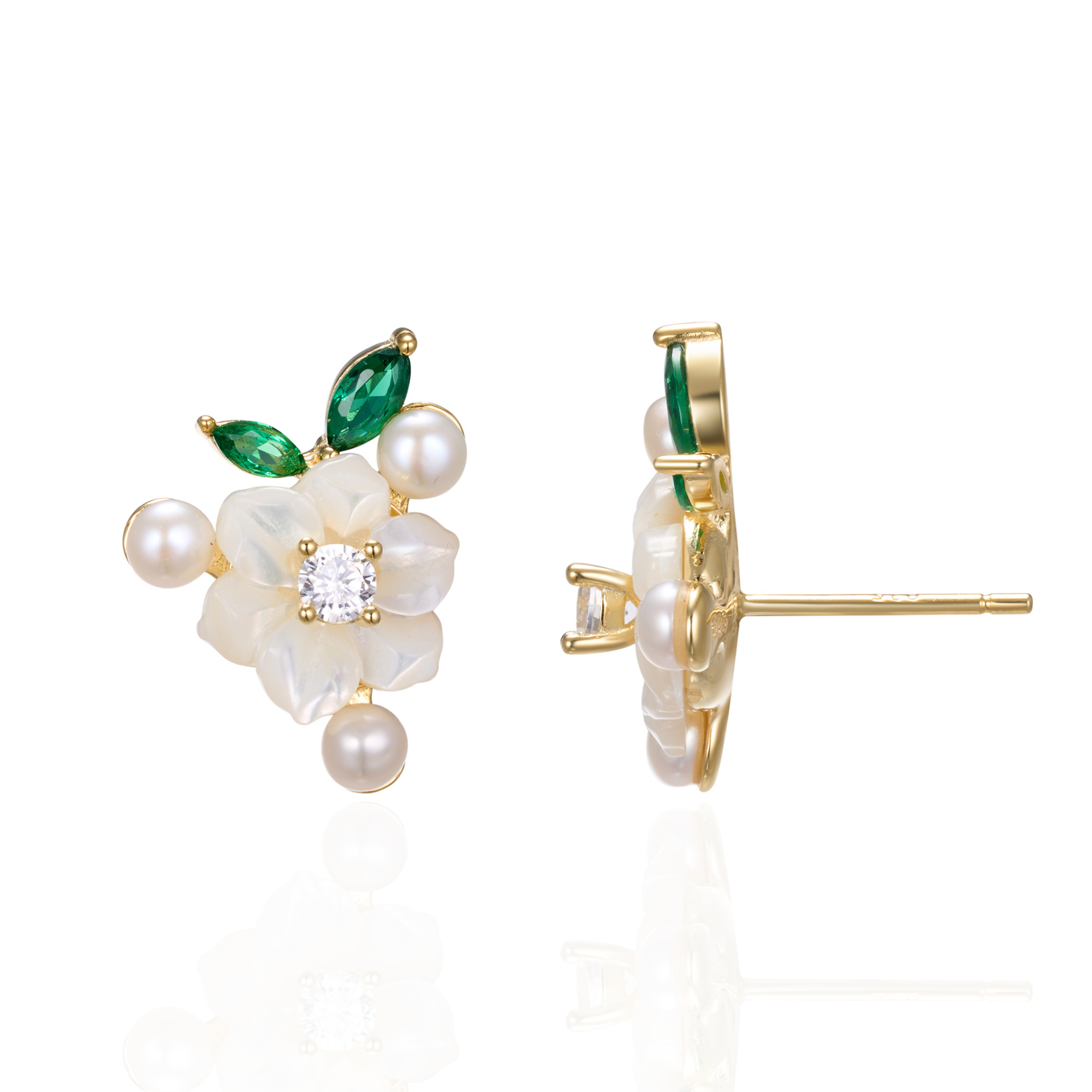 A pair of silver gold plated earrings with green stones, pearls and shell flowers.