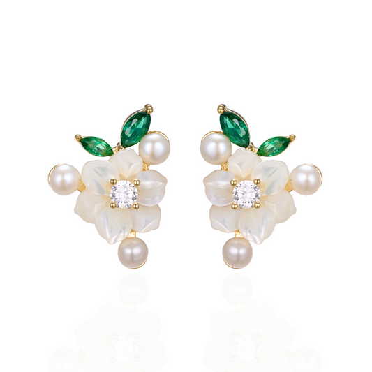 A pair of silver gold plated earrings with green stones, pearls and shell flowers.