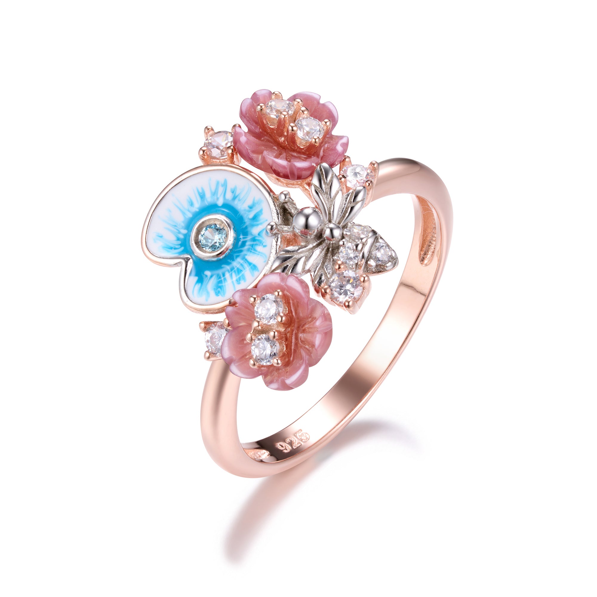 Elegant pink gold plated ring with enamel, pearls and shell flowers.
