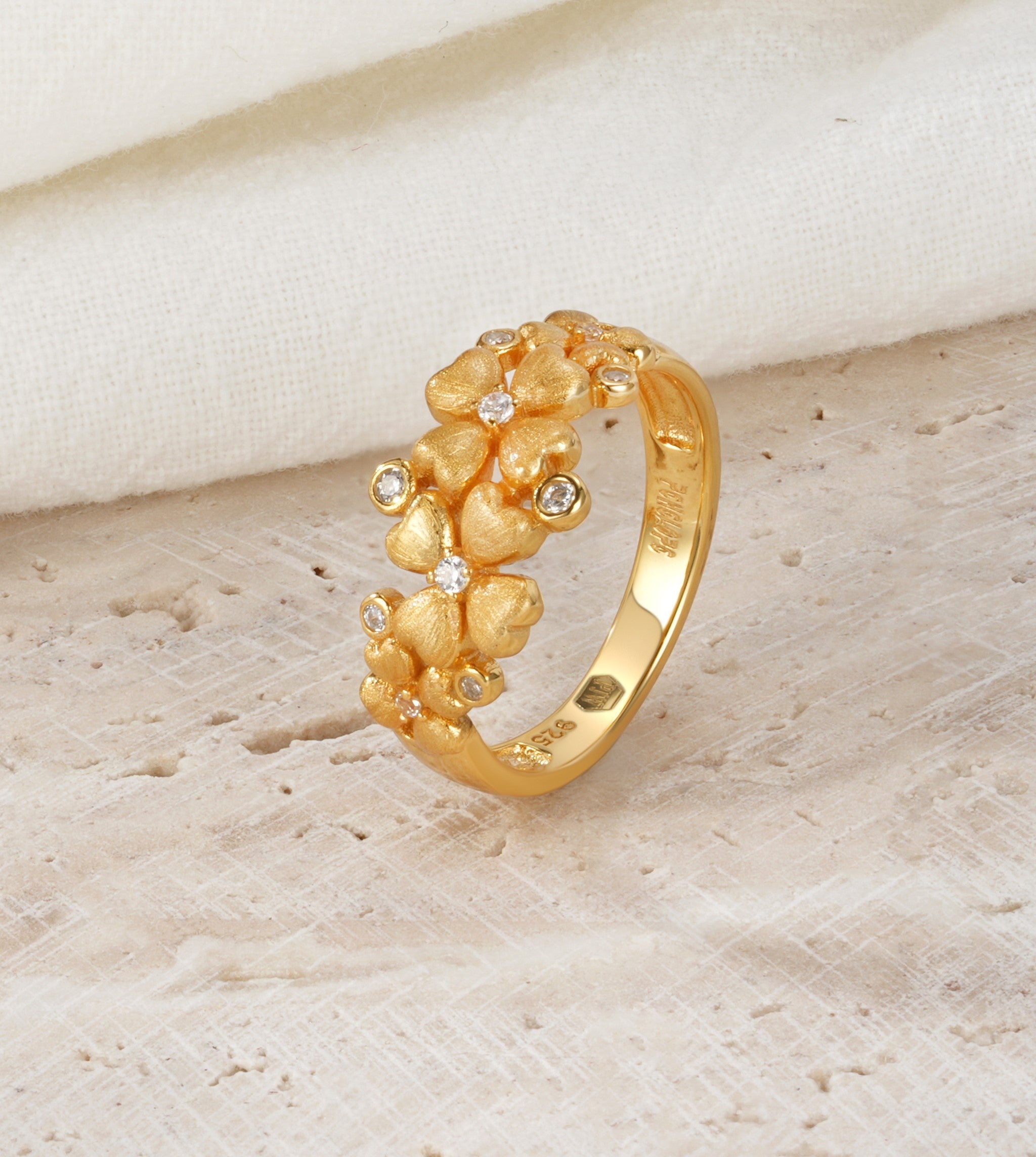 Floral silver ring, pink gold plated with zirconia stones.