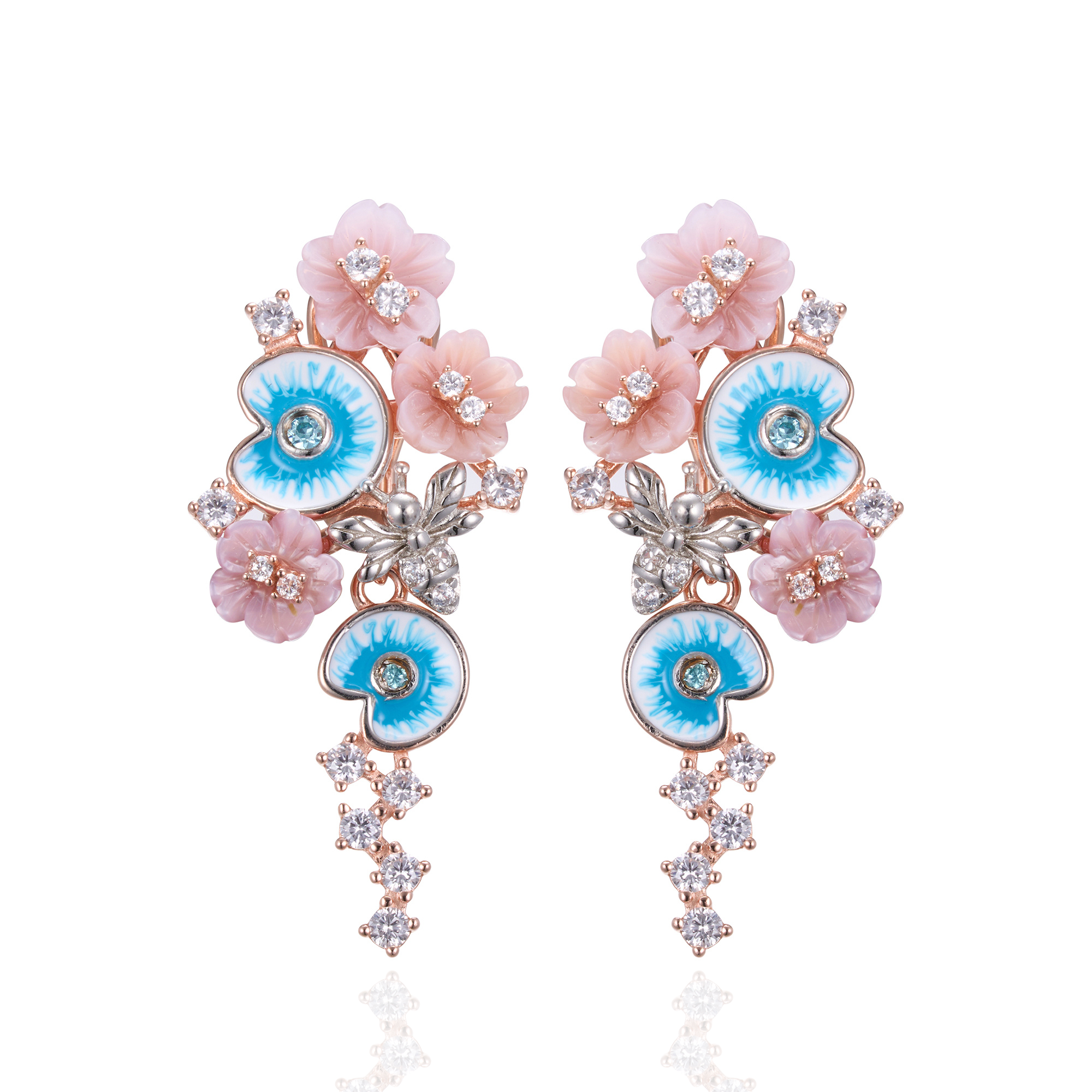 A pair of pink gold plated earrings with pearls, enamel and shell flowers.