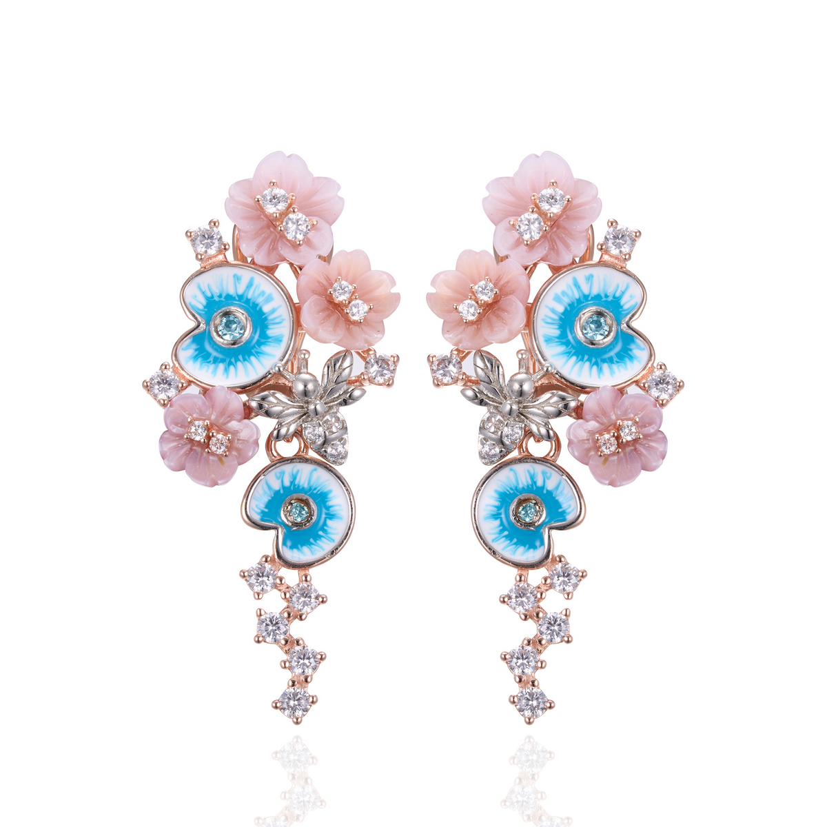 A pair of pink gold plated earrings with pearls, enamel and shell flowers.