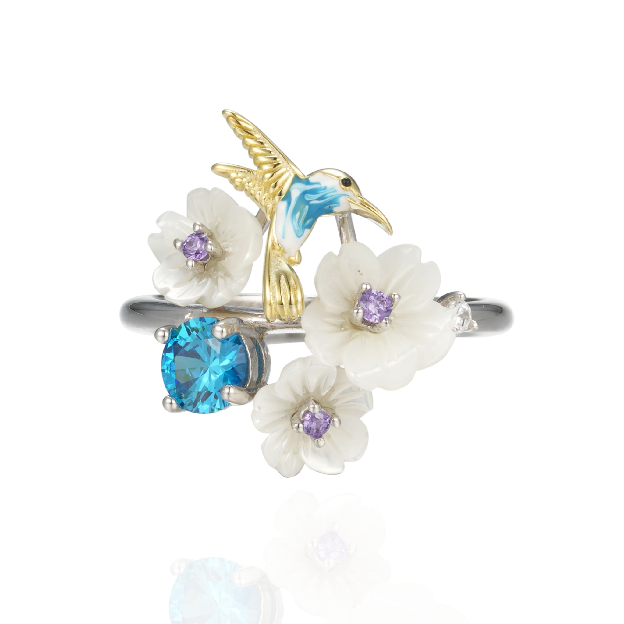 Nje unaze me lule te bardha , nje zog blu flori dhe gure zirkoni
